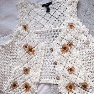 Forever 21 crocheted floral vest , size large . Cropped fit .